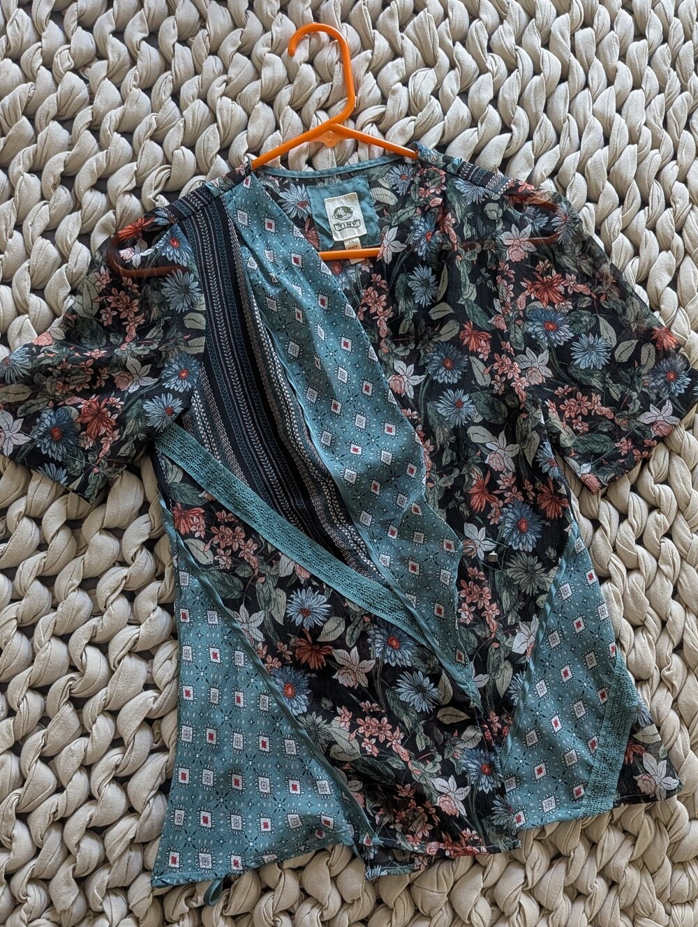 Tiny Brand Floral Sheer Wrap Top in Teal and Black